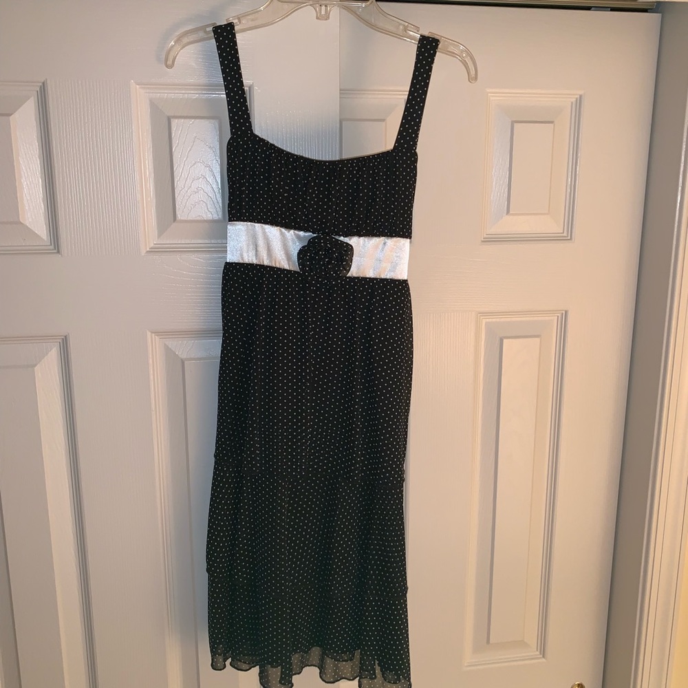 black dress with white polka dots